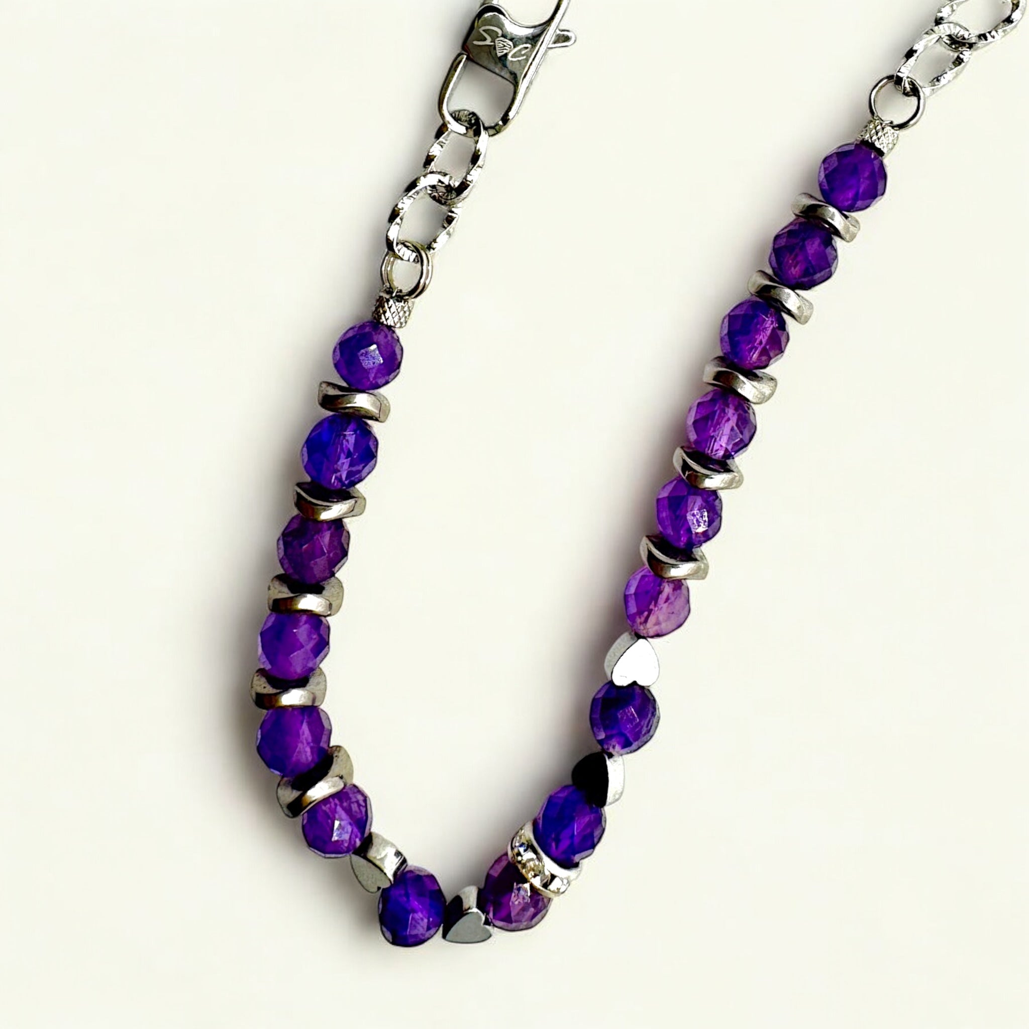 Bracciale Ametista Sfaccettata, Ematite e Punto Luce Sharifa Crystals